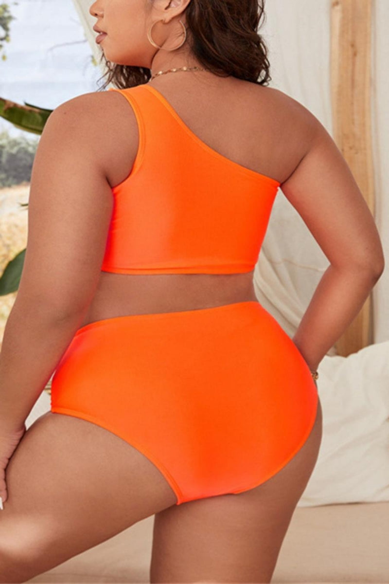 High waist plus size tankini set with padded one shoulder design, available in 4 colors. Perfect for stylish and sexy pool or beach days. Flattering design for all body types.