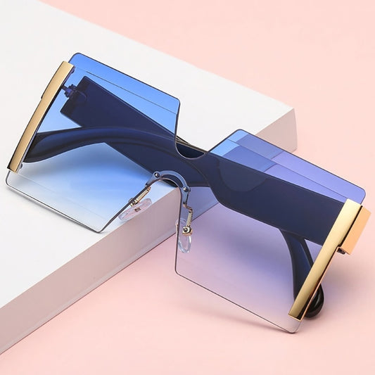 Fashionable and stylish square frameless metal sunglasses in gradient colors with UV protection and polarized lenses. Perfect for a trendy and modern look while also protecting your eyes from harmful UV rays.