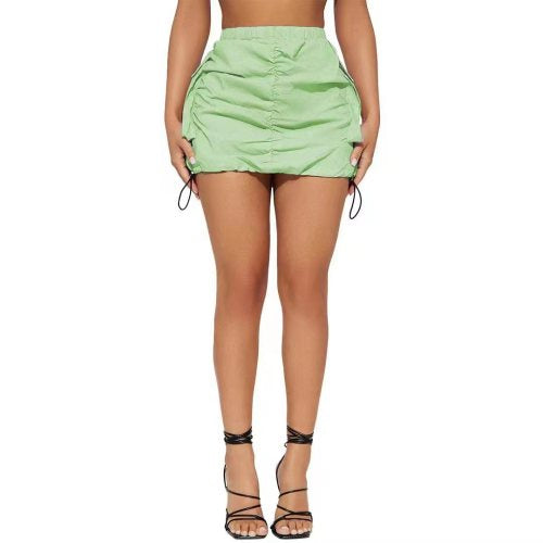 A chic and trendy Women Solid cargo Buckle Mini Skirt, perfect for all occasions. This stylish skirt features cargo pockets and a buckle detail, adding a touch of utility-inspired flair. Pair it with your favorite top and shoes for a fashion-forward look that is sure to turn heads.